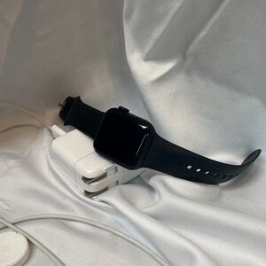 Black Apple Watch SE with Charger